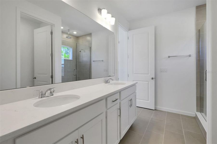 Furnished interior view inside a new home in Serenade at Ovation, Winter Garden (Image 8).