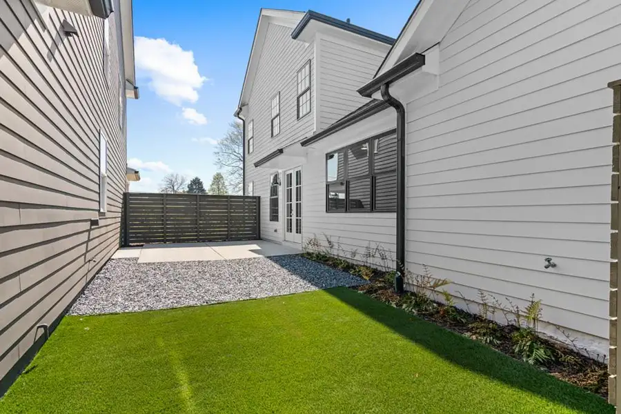 Exterior details and patio area of a home in Harmony, Auburn (Image 3). Exterior details and patio area of a home in Harmony, Auburn (Image 3).