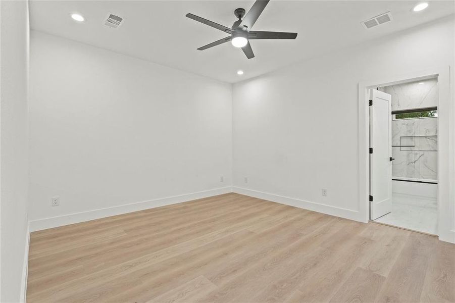 Spare room featuring light wood-style flooring, recessed lighting, and ceiling fan Spare room featuring light wood-style flooring, recessed lighting, and ceiling fan