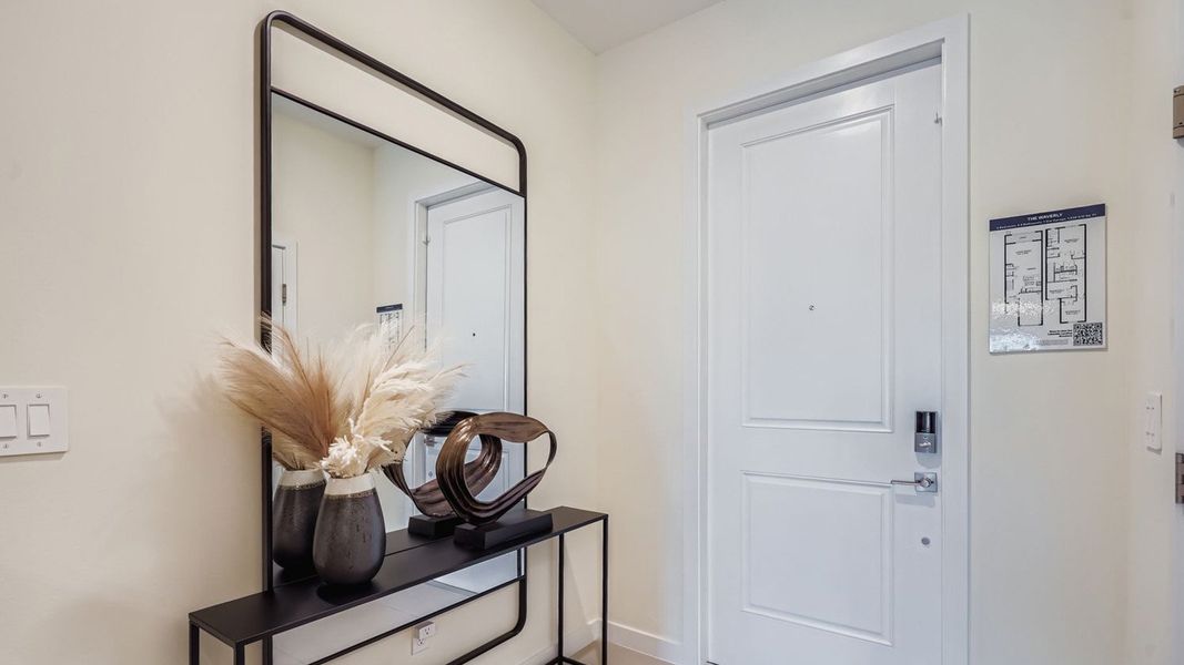 Representative furnished interior of a home built from the Waverly by D.R. Horton in Lakeside Landing, Royal Palm Beach (Image 6).