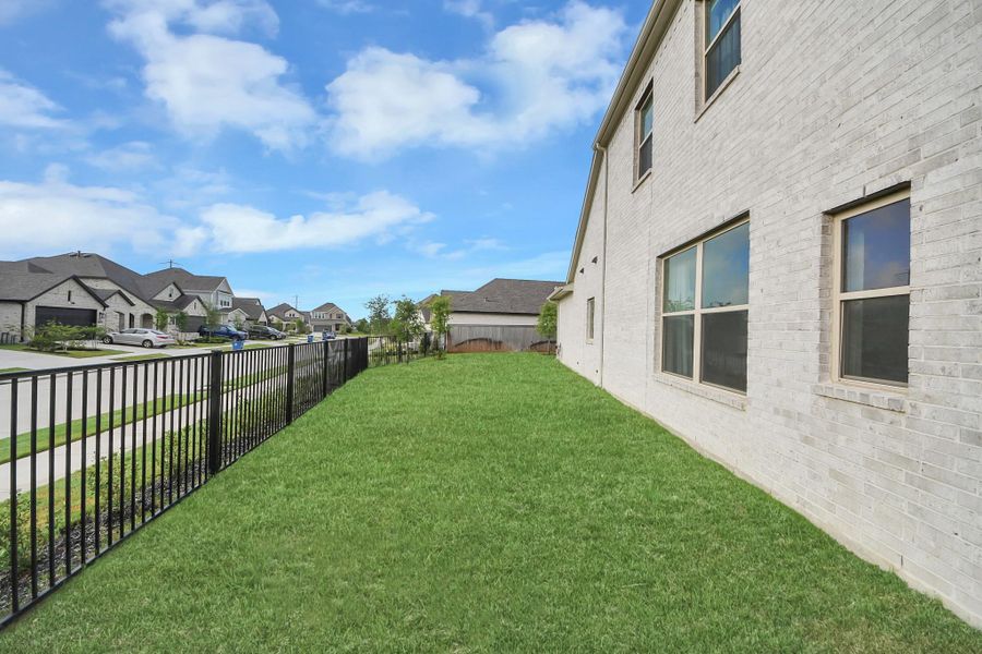 Spacious side yard located on a corner lot.