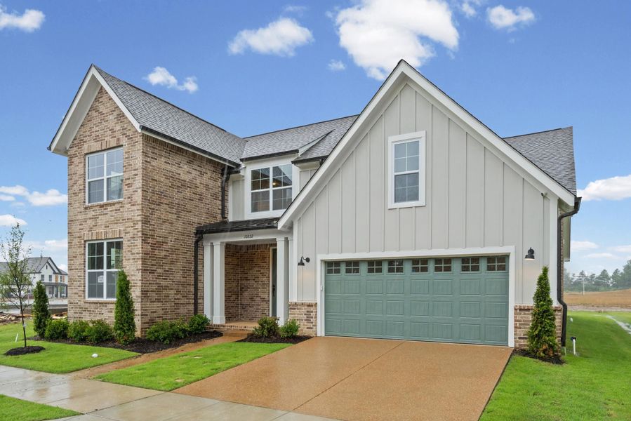 Front exterior of a new home in Lockwood, Collierville, TN, highlighting curb appeal (Image 2). Front exterior of a new home in Lockwood, Collierville, TN, highlighting curb appeal (Image 2).