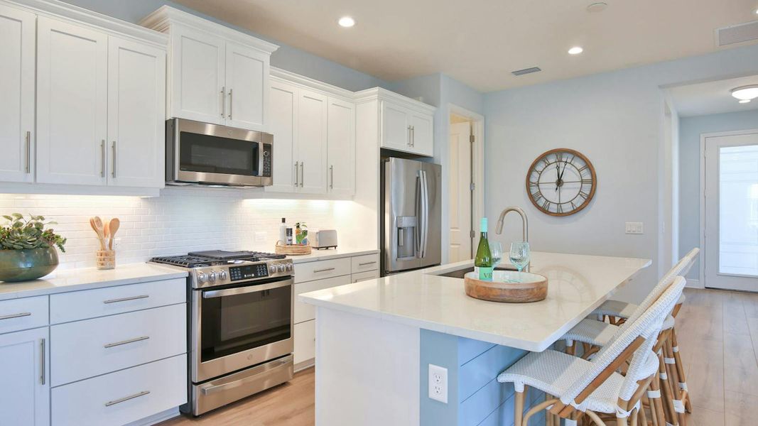 Furnished interior view inside a new home in Palm Grove Real Estate and Homes for Sale in Lakewood Ranch, FL - Neal Communities, Lakewood Ranch (Image 8).