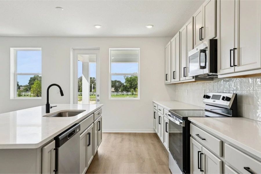 Furnished interior view inside a new home in Ardisia Park, New Smyrna Beach (Image 7).