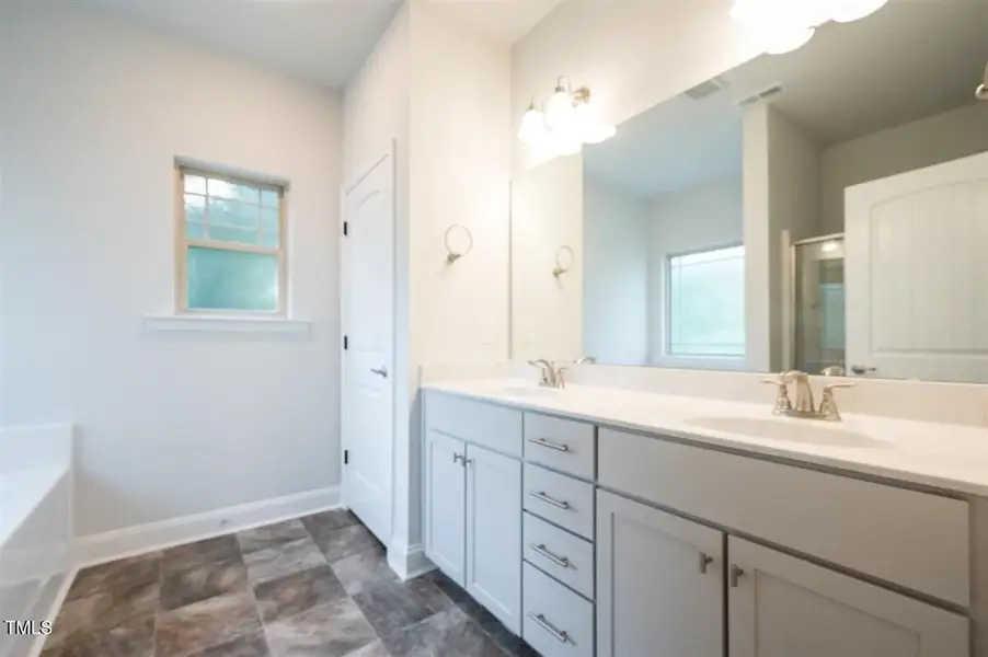Representative furnished interior of a home built from the 2316 by Adams Homes in Hidden Pines, Cameron (Image 6).