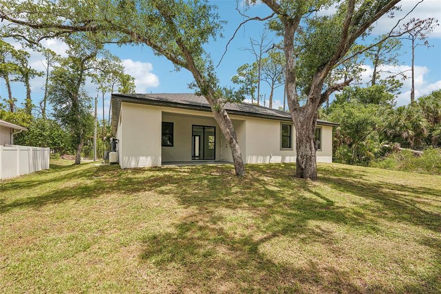 Exterior details and patio area of a home in , Port Charlotte (Image 4).