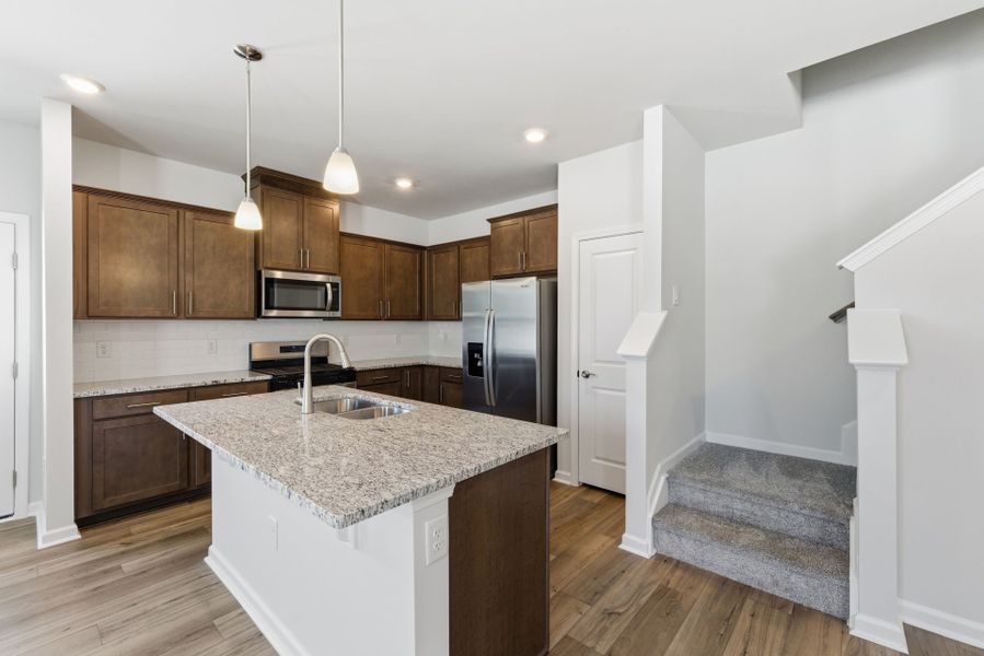 Furnished interior view inside a new home in Poets Walk, Whitsett (Image 7).