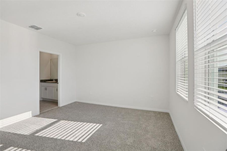 Spacious, unfurnished interior of a new home in Springs at Lake Alfred - Classic Series, Lake Alfred (Image 22).