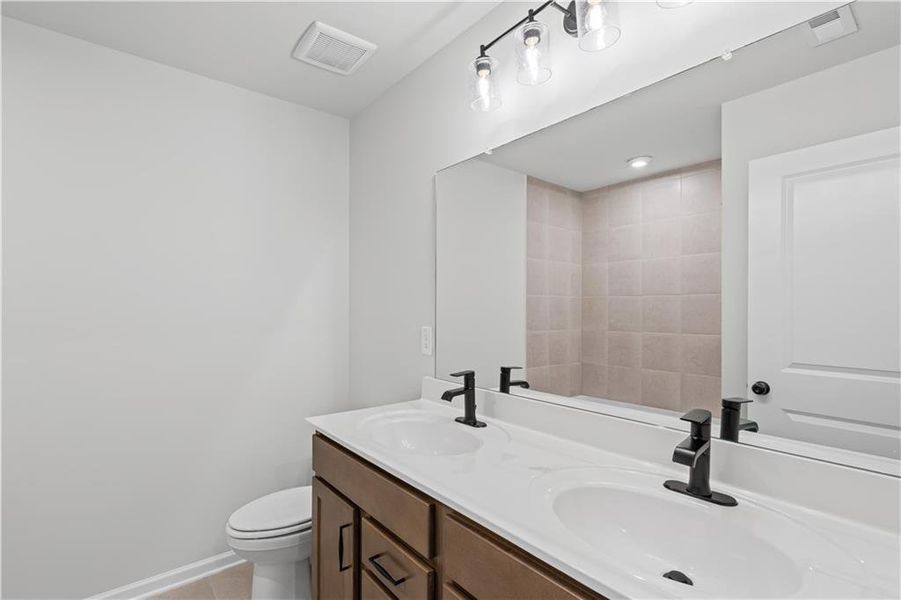 Furnished interior view inside a new home in Reunion, Flowery Branch (Image 14). Furnished interior view inside a new home in Reunion, Flowery Branch (Image 14).