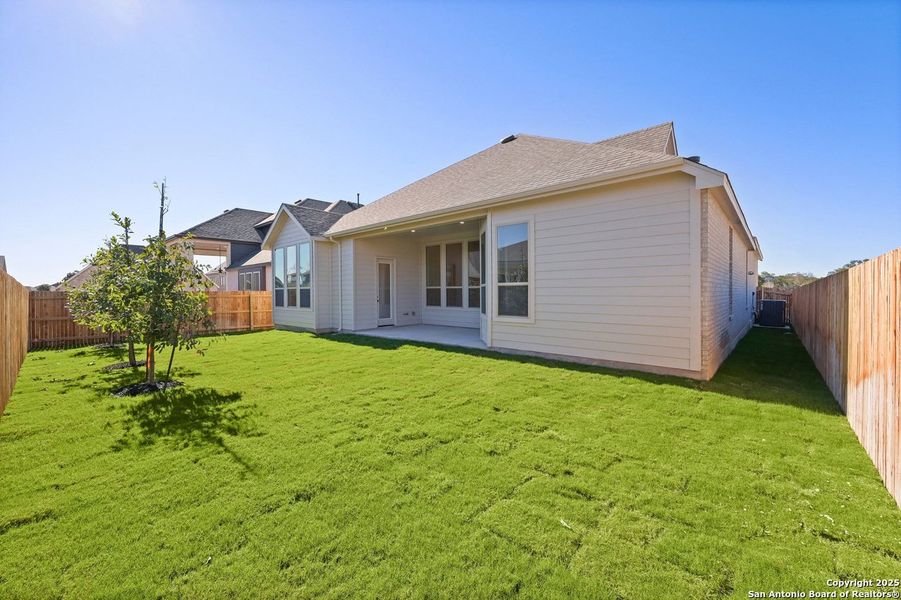 Exterior details and patio area of a home in Davis Ranch: 60ft. lots, San Antonio (Image 18).
