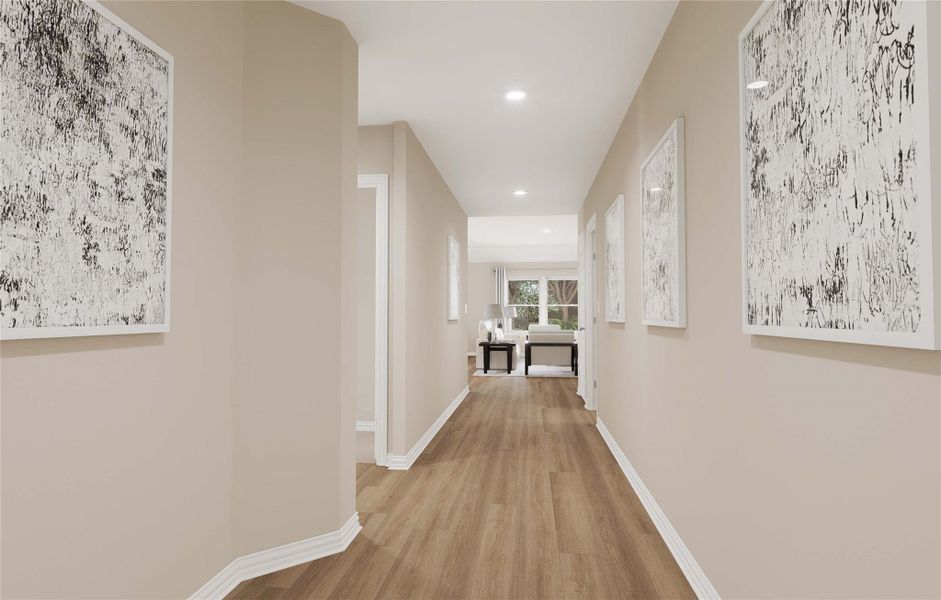 Corridor featuring baseboards, wood finished floors, and recessed lighting Corridor featuring baseboards, wood finished floors, and recessed lighting