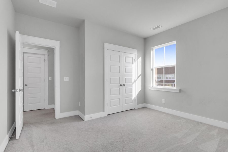 Spacious, unfurnished interior of a new home in Carnes Crossroads: Coastal Collection, Summerville (Image 18).