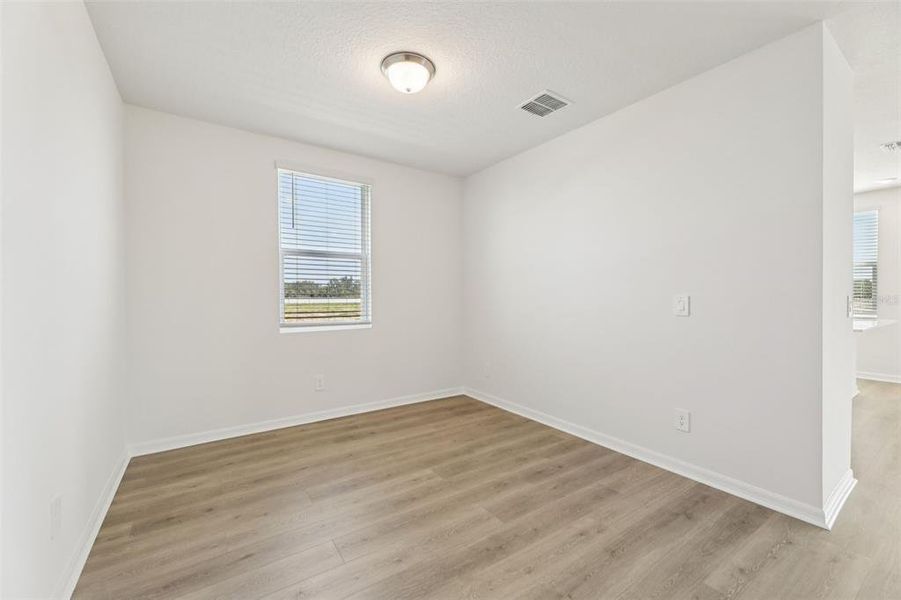 Spacious, unfurnished interior of a new home in Crosswinds - Signature Series, Haines City (Image 31).