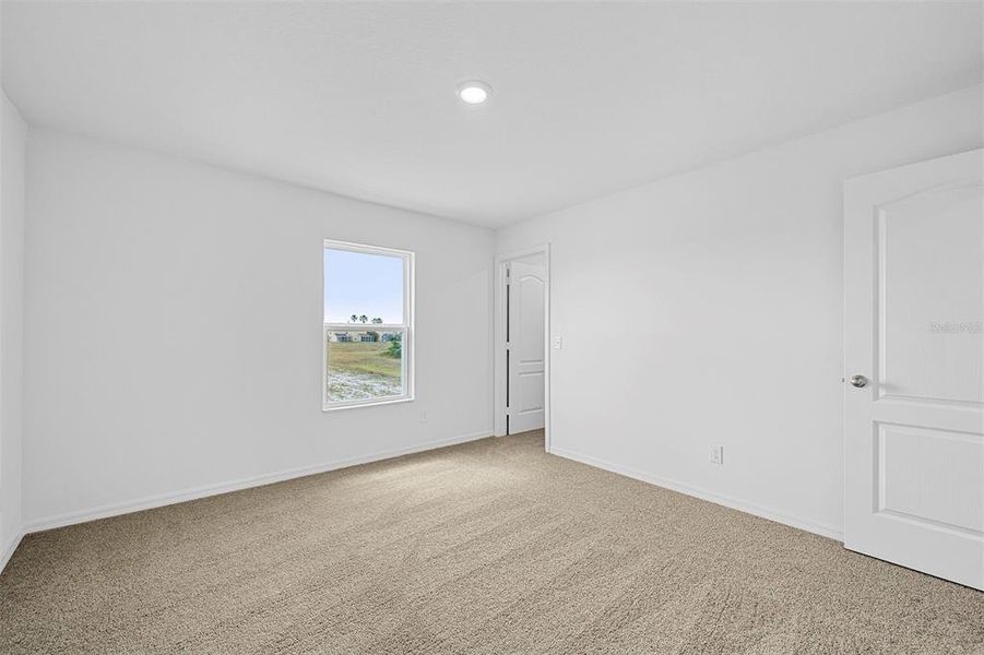 Spacious, unfurnished interior of a new home in Noah Estates at Tuscany Preserve, Poinciana (Image 11). Spacious, unfurnished interior of a new home in Noah Estates at Tuscany Preserve, Poinciana (Image 11).