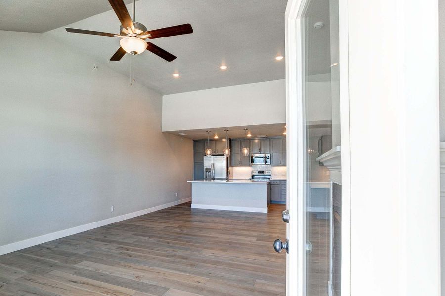 View of Living Room from Covered Terrace  - Not Actual Home - Finishes May Vary