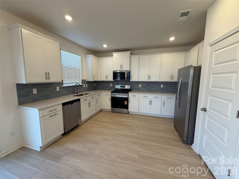 Furnished interior view inside a new home in Wellington Pointe Classic, Monroe (Image 6).