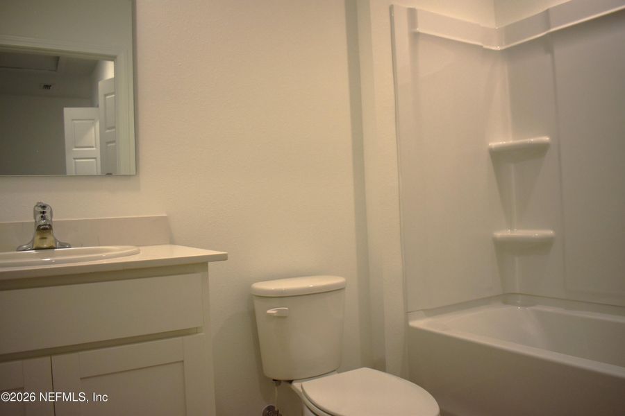 Furnished interior view inside a new home in Irongate Villas, Jacksonville (Image 7).