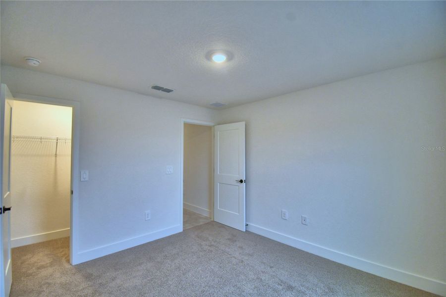 Spacious, unfurnished interior of a new home in Cadence Crossing, Auburndale (Image 45).