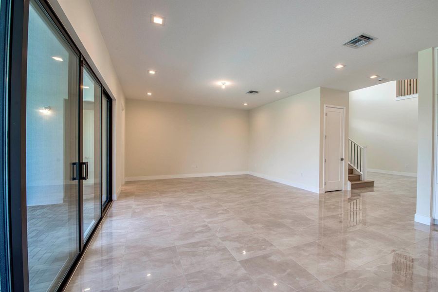 Furnished interior view inside a new home in Apex at Avenir, Palm Beach Gardens (Image 37).