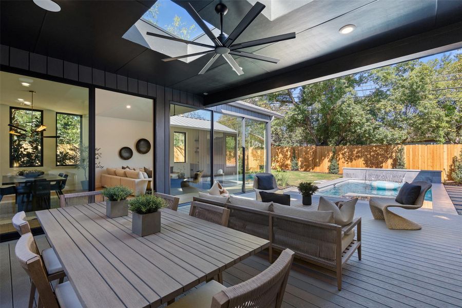 Outdoor living, covered patio with skylights.