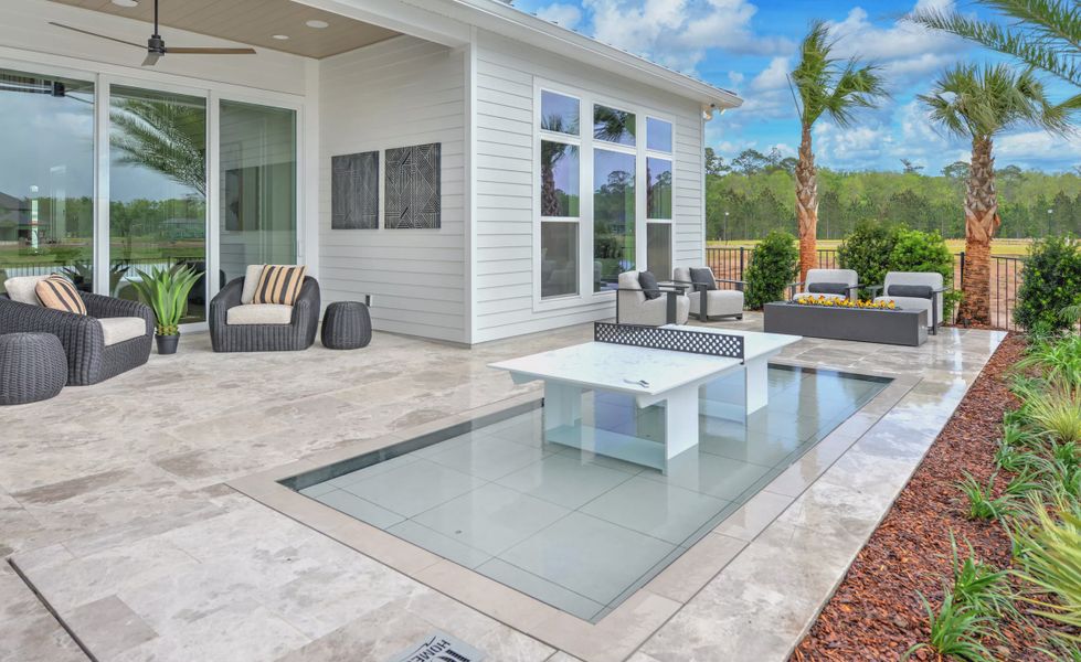 Exterior details and patio area of a home in EverRange, Jacksonville (Image 21).