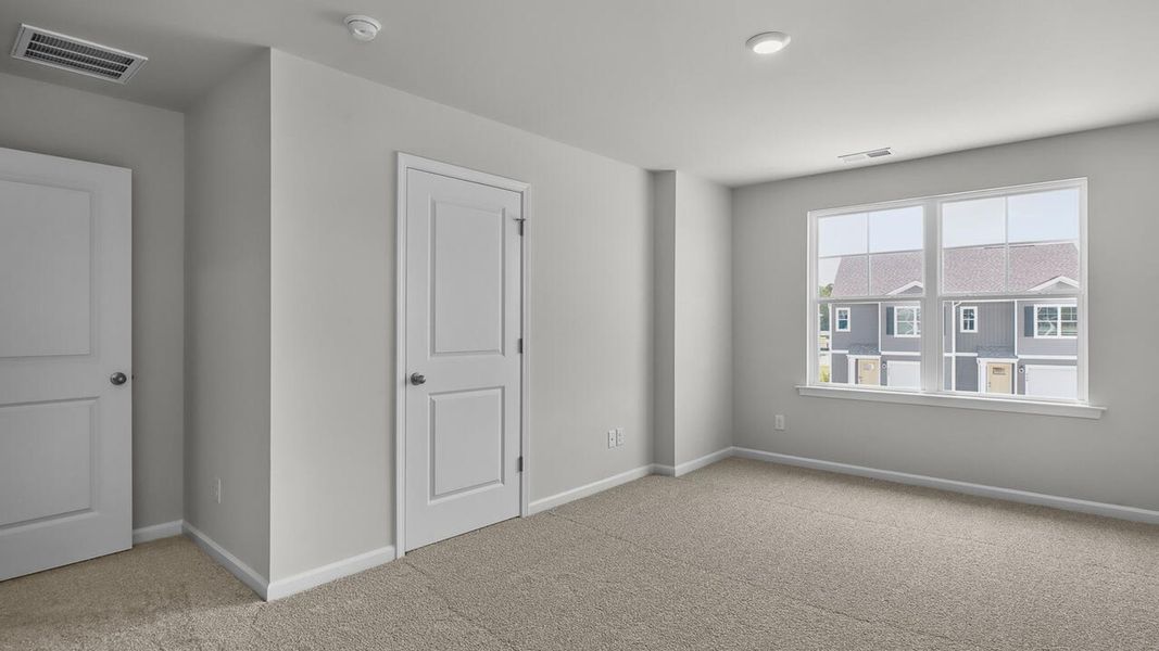 Spacious, unfurnished interior of a new home in Townes at Seabrooke, Leland (Image 20).