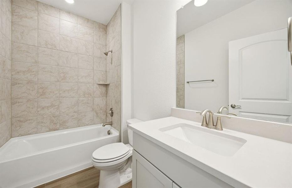 Stylish secondary bath with high-end fixtures *Real home pictured Stylish secondary bath with high-end fixtures *Real home pictured