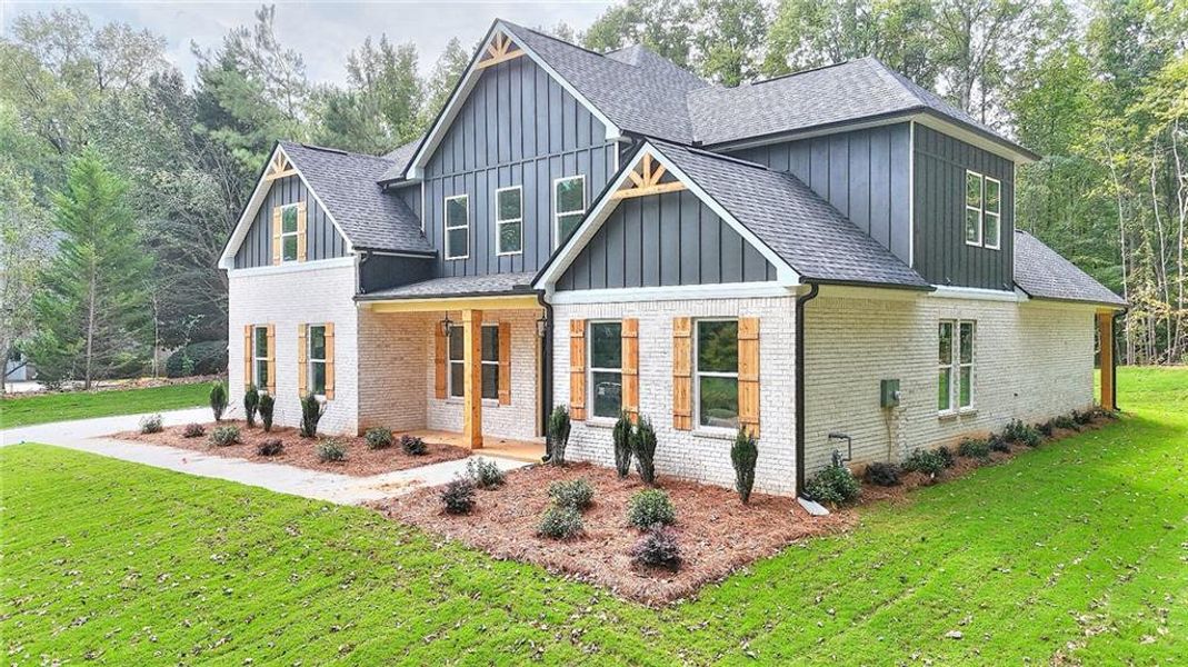 Front exterior of a new home in , Monroe, GA, highlighting curb appeal (Image 2). Front exterior of a new home in , Monroe, GA, highlighting curb appeal (Image 2).