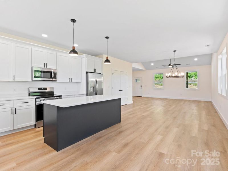 Pull up a chair to the center island bar for entertaining while cooking.