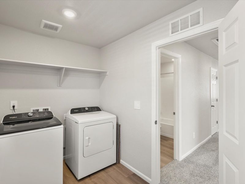 Furnished interior view inside a new home in Buffalo Highlands: The Flora Collection, Commerce City (Image 8).