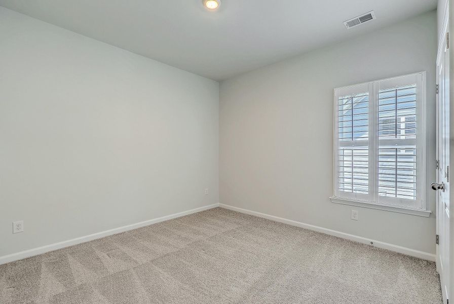 Spacious, unfurnished interior of a new home in The Ponds, Summerville (Image 41). Spacious, unfurnished interior of a new home in The Ponds, Summerville (Image 41).
