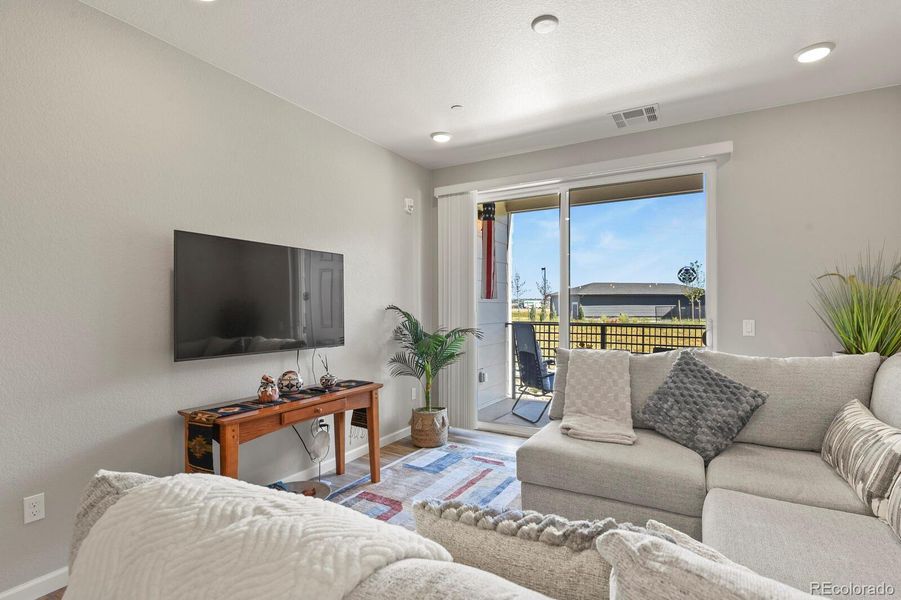 Furnished interior view inside a new home in Stonegate Condos, Parker (Image 15).