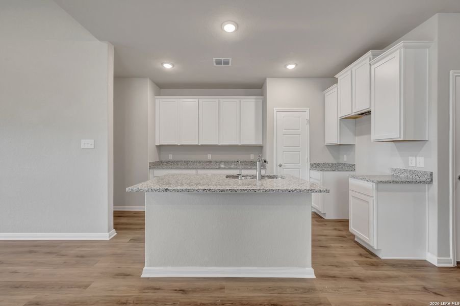 Furnished interior view inside a new home in Hunters Ranch, San Antonio (Image 6).