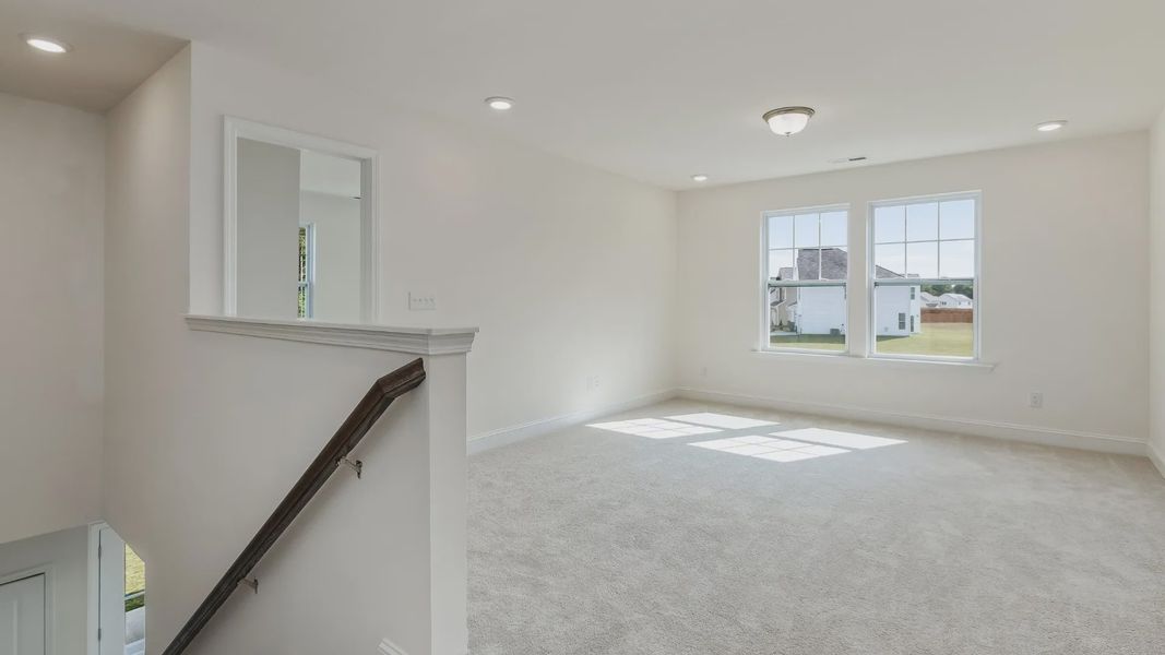 Furnished interior view inside a new home in Station Pointe, Angier (Image 10).
