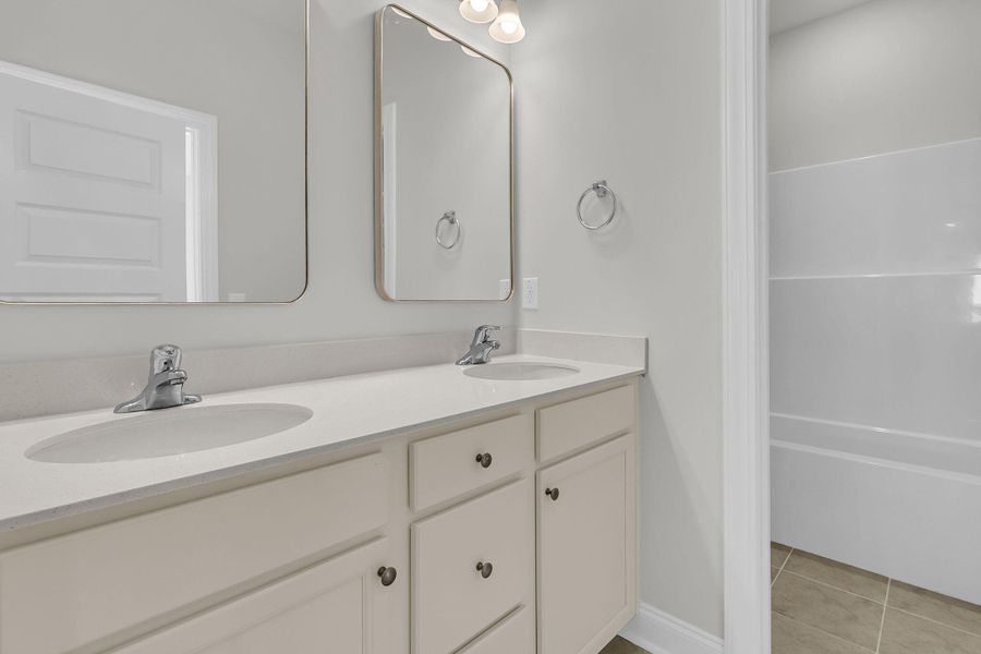 Furnished interior view inside a new home in Tidewater at Lakes of Cane Bay, Summerville (Image 10). Furnished interior view inside a new home in Tidewater at Lakes of Cane Bay, Summerville (Image 10).