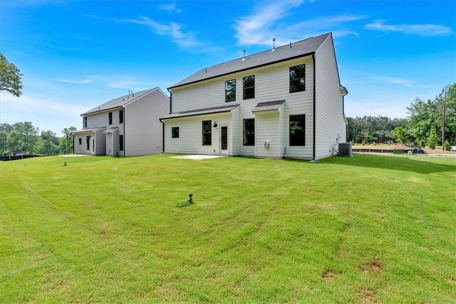 Exterior details and patio area of a home in The Overlook at Factory Shoals, Mableton (Image 24).