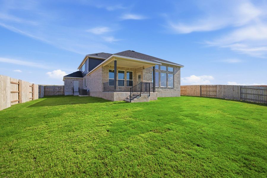 Exterior details and patio area of a home in Lariat, Liberty Hill (Image 24). Exterior details and patio area of a home in Lariat, Liberty Hill (Image 24).
