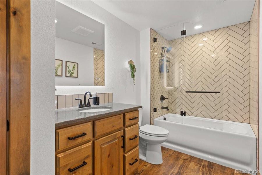 Downstairs Full Bathroom with Glass Shower Door (No Shower Curtains- Yay!)