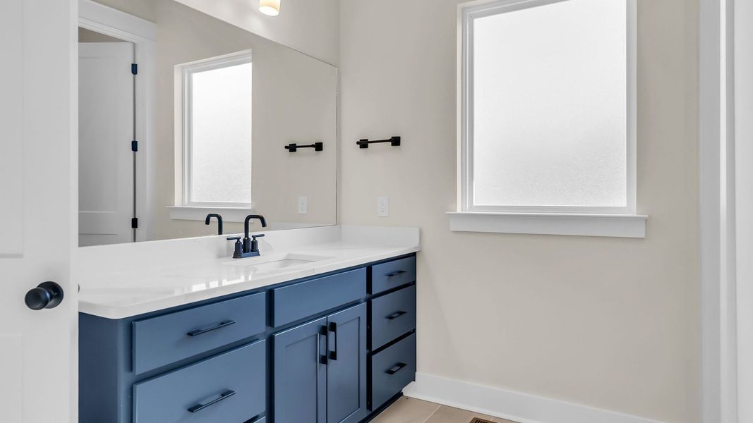 Furnished interior view inside a new home in Richvale Estates, Fairview (Image 32).