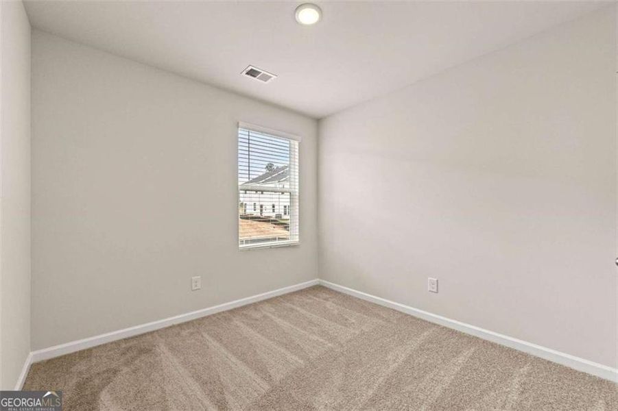 Spacious, unfurnished interior of a new home in The Grove At Mundy Mill, Gainesville (Image 12).