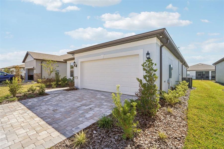 Exterior details and patio area of a home in Del Webb Stone Creek, Ocala (Image 4).