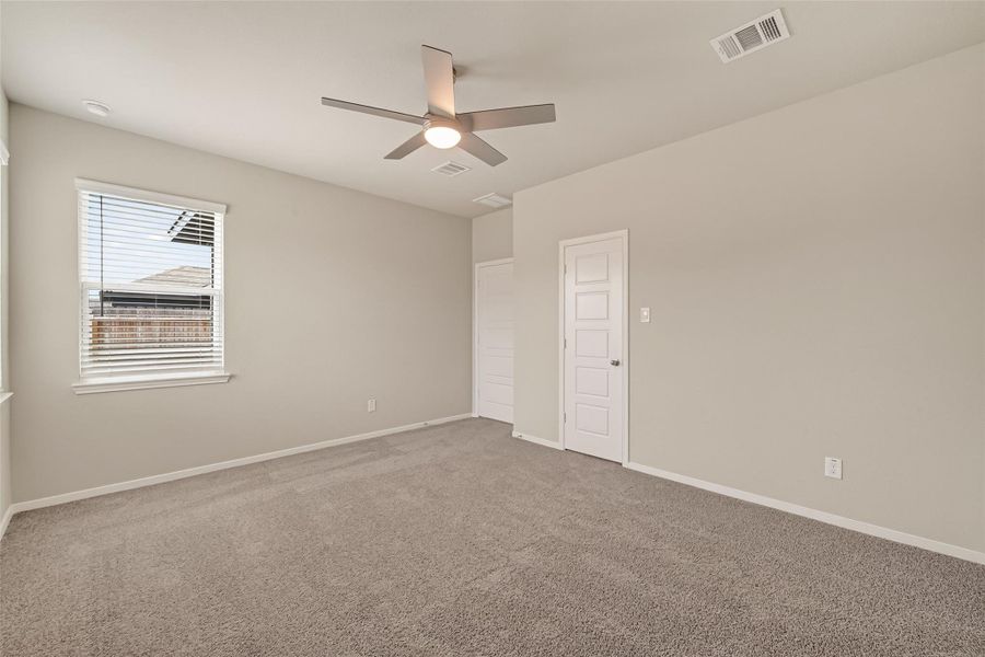 Spacious, unfurnished interior of a new home in Sunterra, Katy (Image 39).