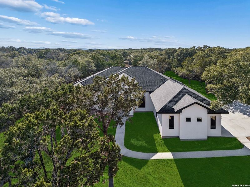 Front exterior of a new home in , Spring Branch, TX, highlighting curb appeal (Image 30).