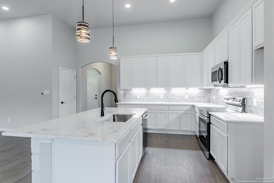 Furnished interior view inside a new home in , Fischer (Image 12). Furnished interior view inside a new home in , Fischer (Image 12).