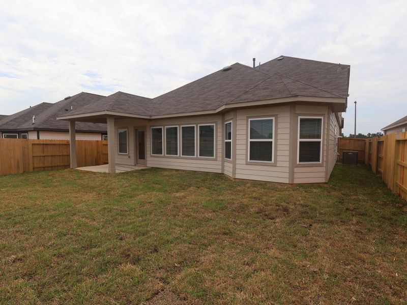 Exterior details and patio area of a home in Lone Star Landing, Montgomery (Image 4).