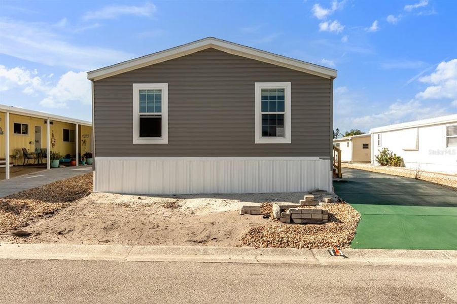 Exterior details and patio area of a home in , Bradenton (Image 17).