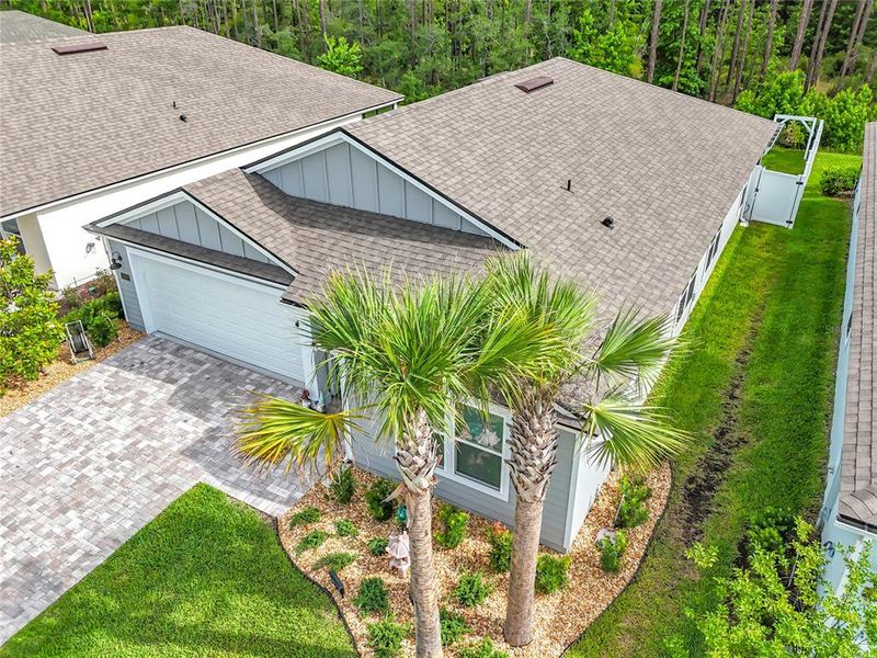 Exterior details and patio area of a home in Sawmill Branch Express, Palm Coast (Image 3).