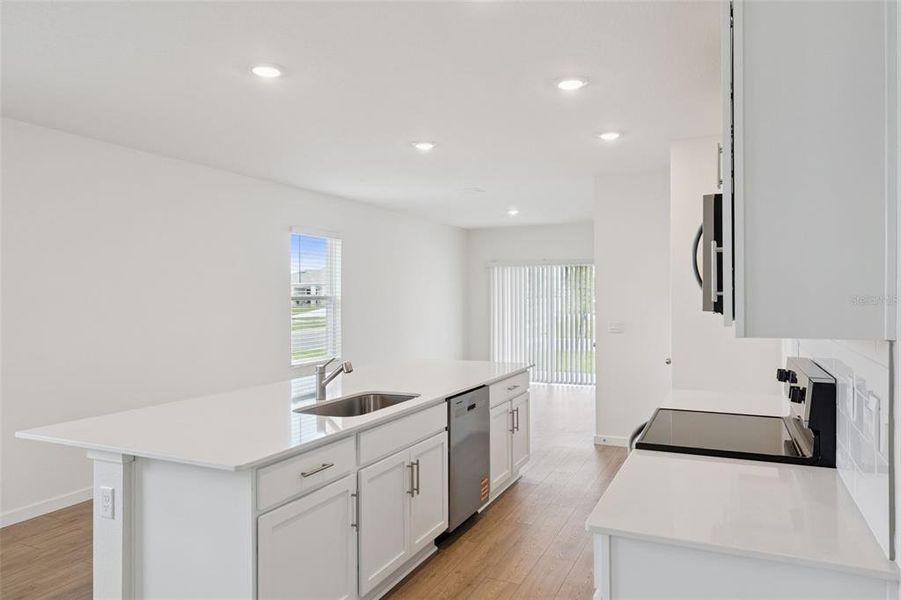 Furnished interior view inside a new home in Crossroads at Kelly Park, Apopka (Image 7). Furnished interior view inside a new home in Crossroads at Kelly Park, Apopka (Image 7).