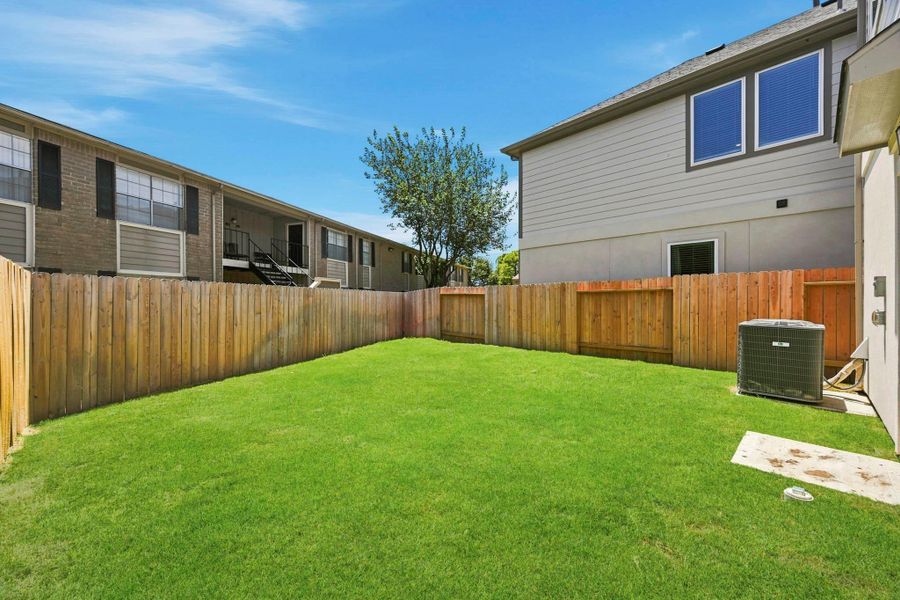 Exterior details and patio area of a home in Park Hill Villas, Stafford (Image 3).