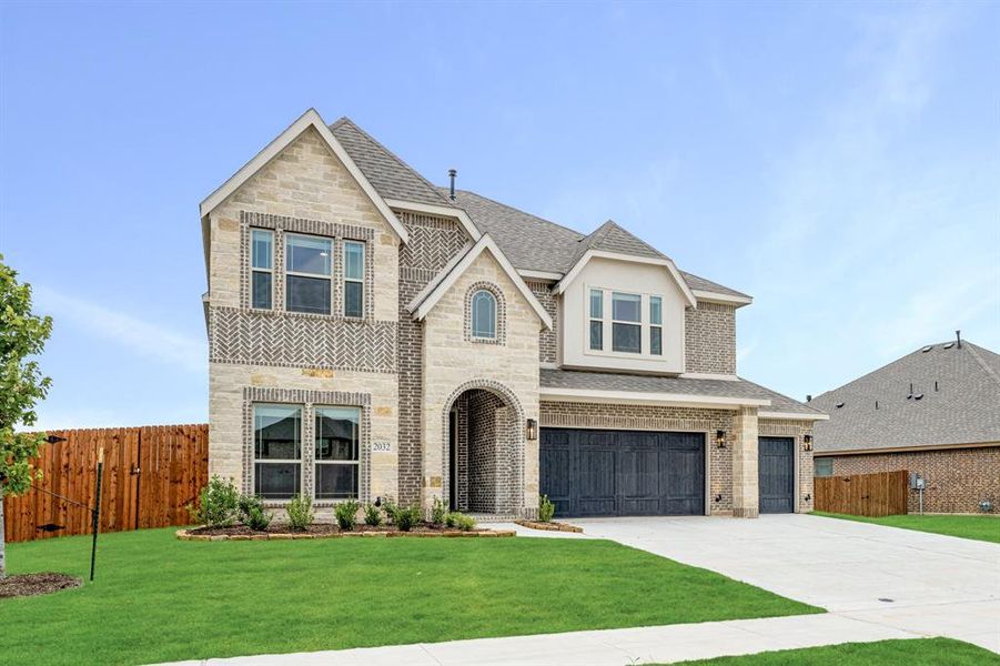 Front exterior of a new home in Homestead at Daniel Farms Phase 2, DeSoto, TX, highlighting curb appeal (Image 27). Front exterior of a new home in Homestead at Daniel Farms Phase 2, DeSoto, TX, highlighting curb appeal (Image 27).